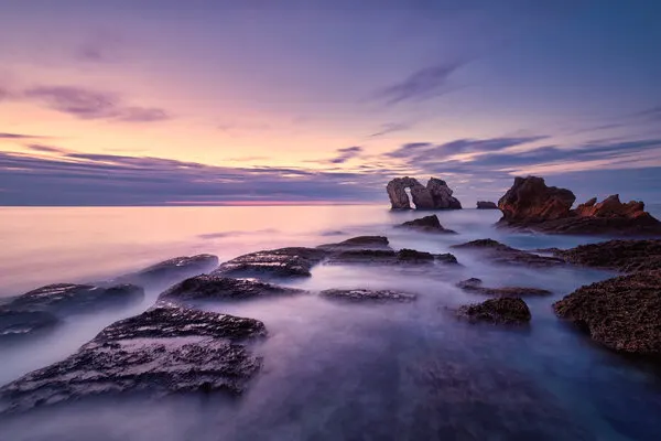 Ethereal Coastal Arch Sunset, wall art by Sergio Cameno