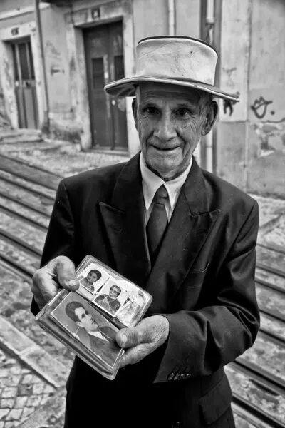 Man with Old Photos, wall art by Luis Sarmento