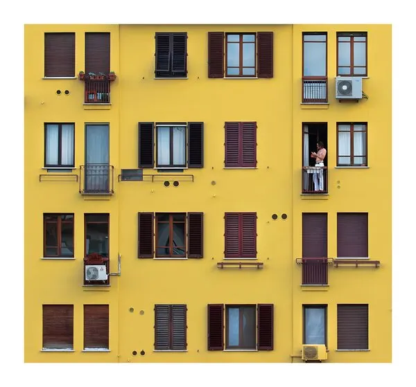 Man on Yellow Balcony, wall art by Karim Al Thahaby