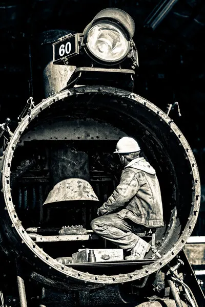 Worker Inside Steam Train, wall art by Patrick Compagnucci