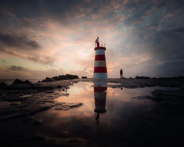 Lighthouse Sunset Reflection, wall art by Marco Faria