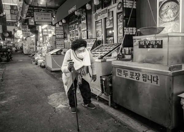 Elderly Woman Korean Market, wall art by Rudy Mareel