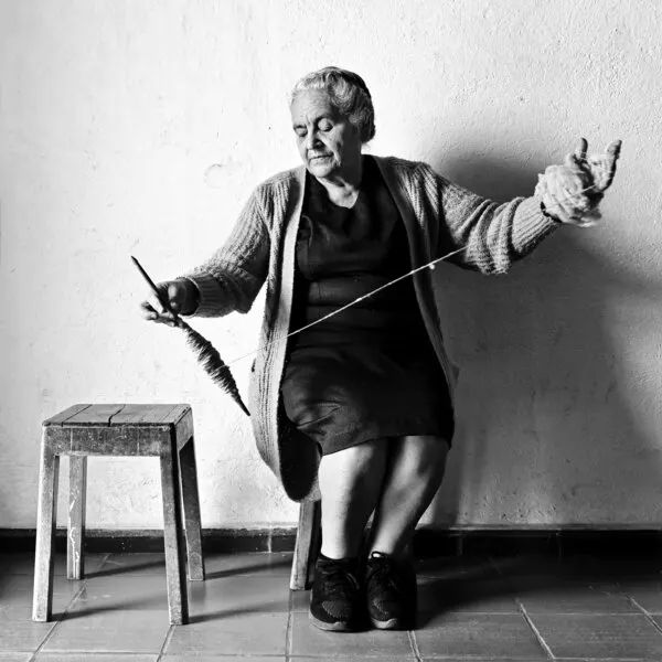 Elderly Woman Spinning, wall art by Cesar Tejada